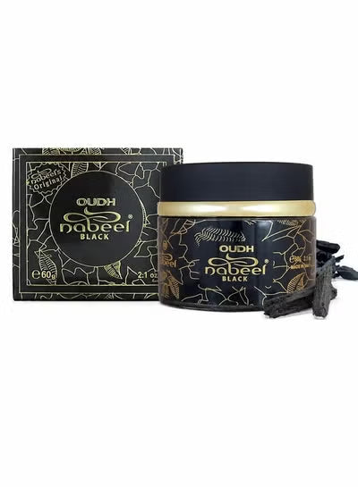 A jar of Oudh Nabeel Black with its matching outer box and a few dark dried flower buds, displayed on a clean white background.