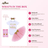 What's in the box - bodysuit, tutu, headband, leg warmers, cake topper